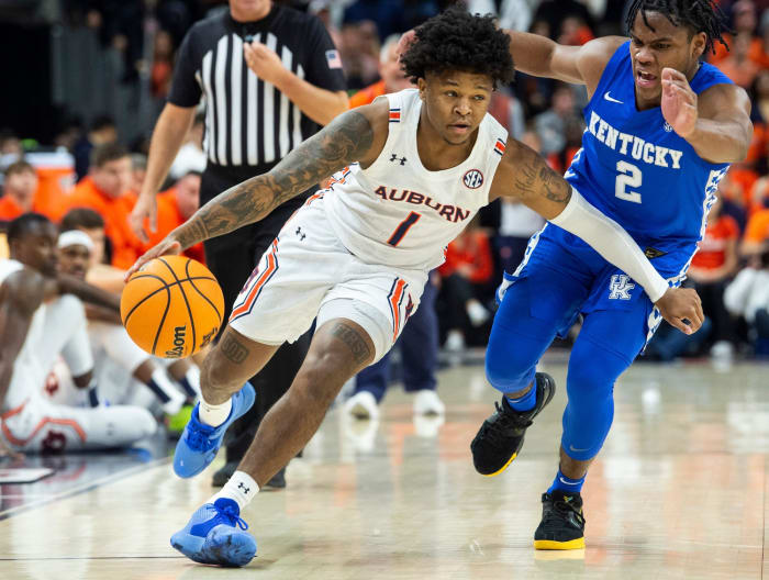 Auburn Tigers guard Wendell Green Jr. (1) drives the ball as Auburn Tigers men's basketball takes on Kentucky Wildcats at Auburn Arena in Auburn, Ala., on Saturday, Jan. 22, 2022. Kentucky lead Auburn 33-29 at halftime, but the Tigers came out hot and held on for an 80-71 victory.